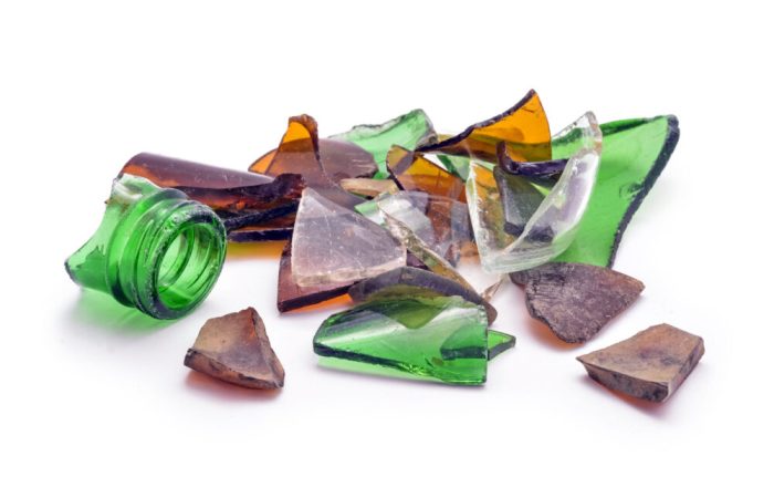 broken old glass pieces on white background
